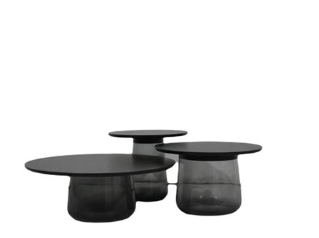 LC 188 - Wood and glass table set.