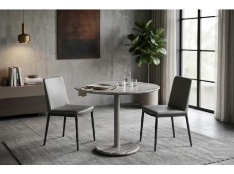 PORSH - Round travertine dining table.