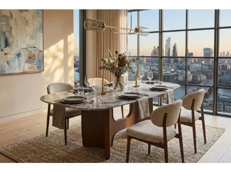 T808 - Black and bronze marble table.